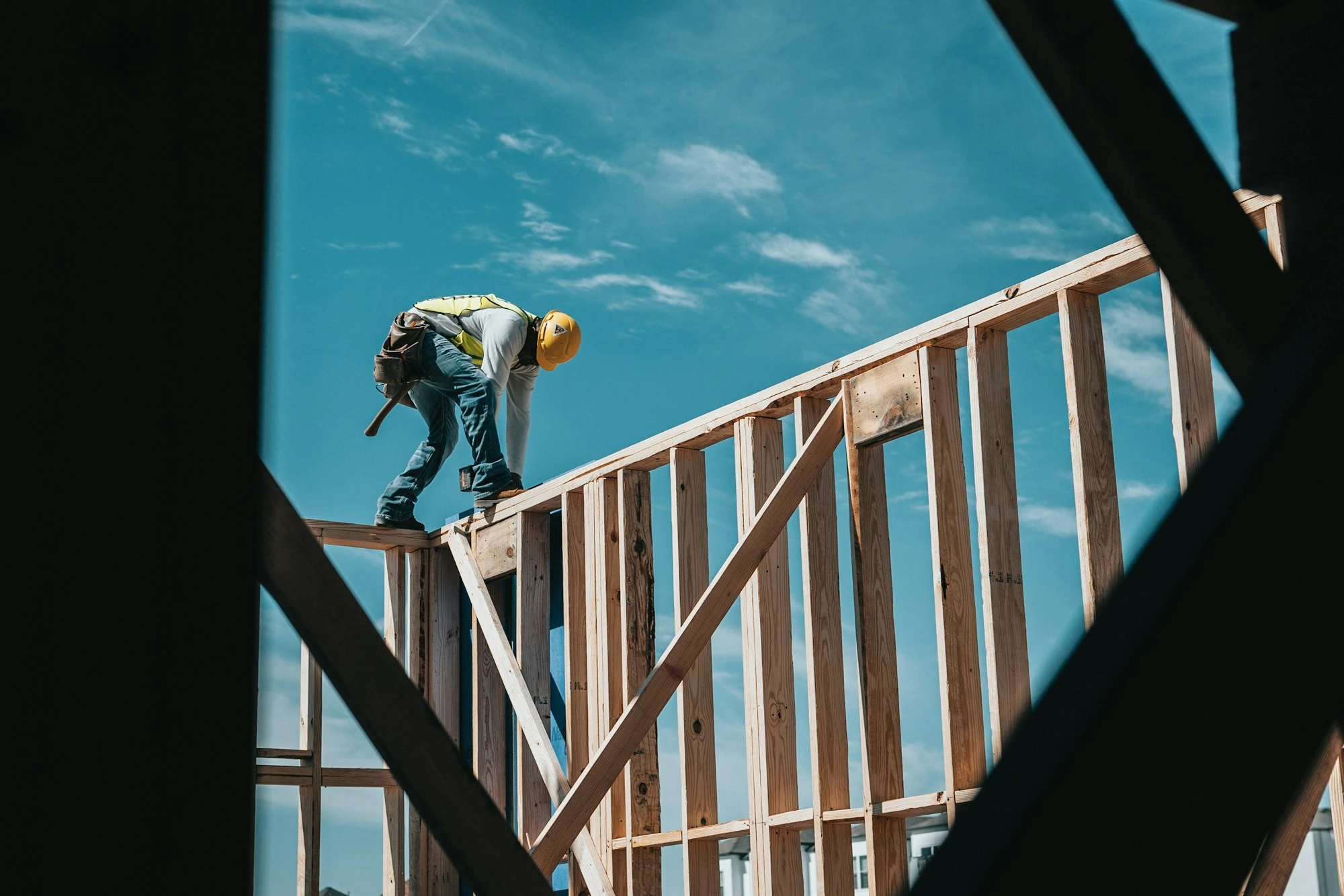 Builder working on the framing of a new home in Lakeland