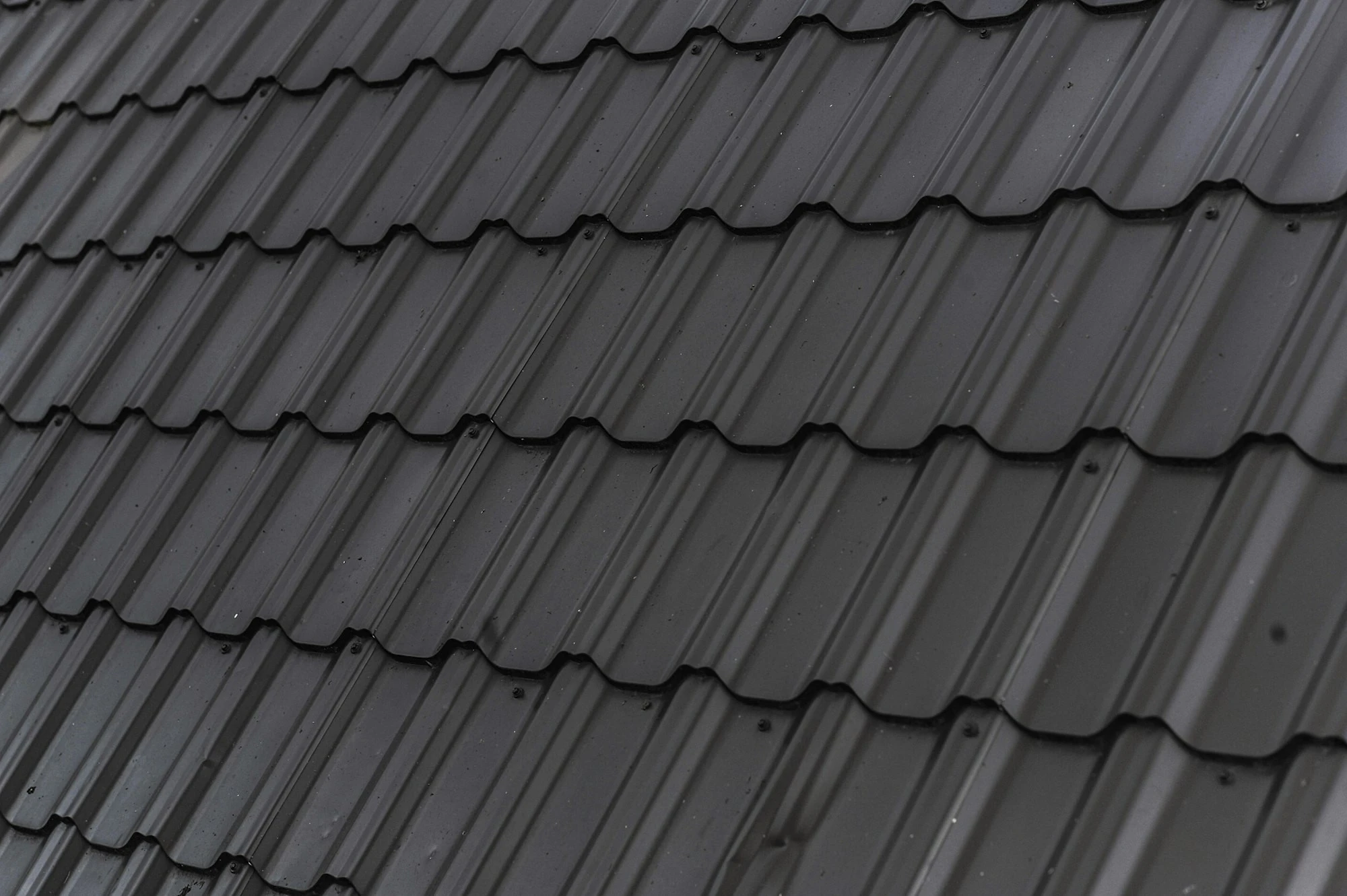 New architectural asphalt shingles on a replaced roof