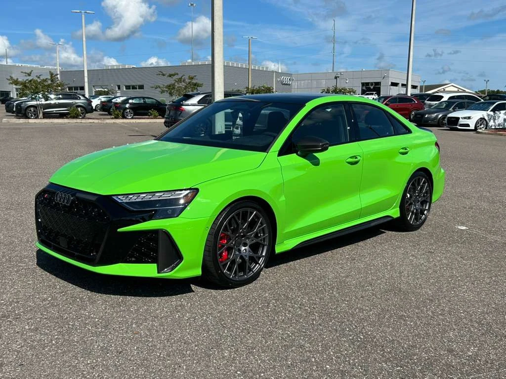 Vehicle being washed, displayed in a front-line dealership row in Central Florida