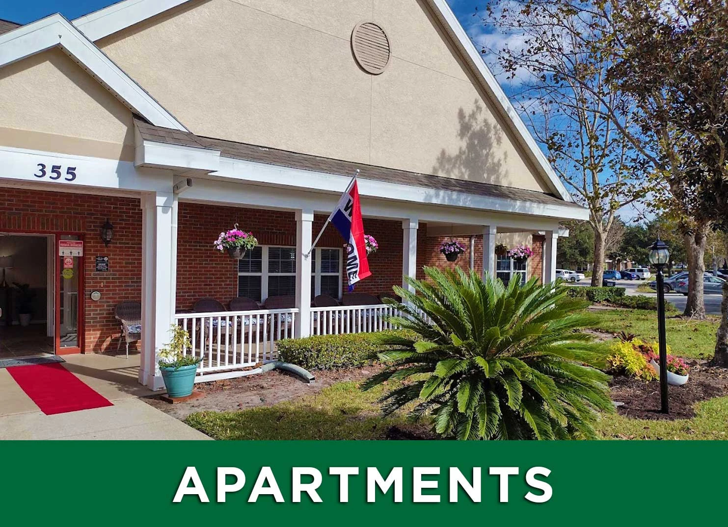 Exterior of Ansley Court and Cottage apartments with link to learn more about the facility