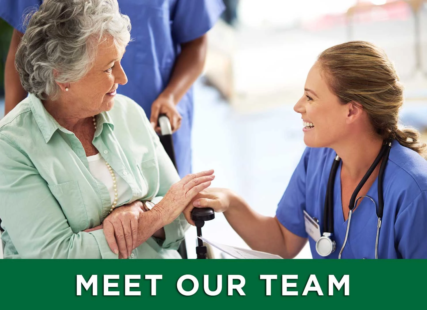 senior aged woman in a wheelchair talking to nurse with a link to meet the team at Ansley Court and Cottage Oviedo