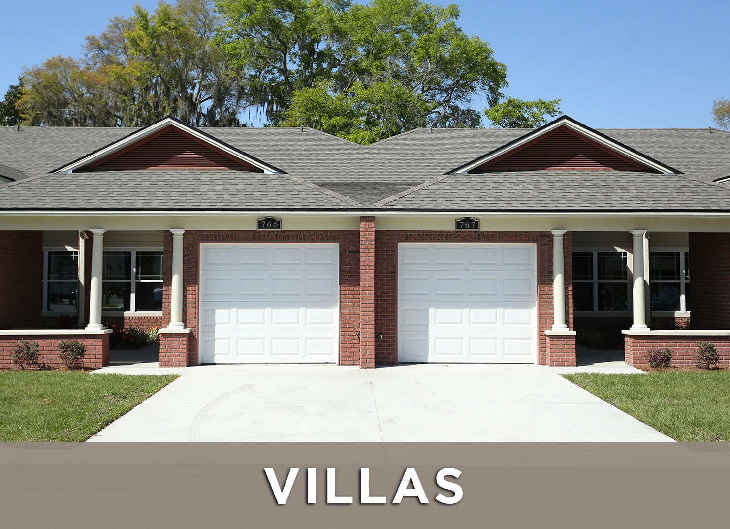 Exterior of Hunters Creek Villas with a link to learn more about floor plans