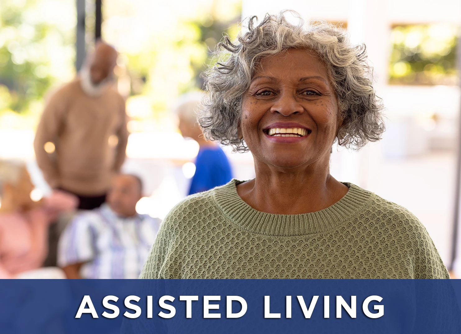 Image: happy woman smiling with friends in the background and a link to the assisted living page to learn more
