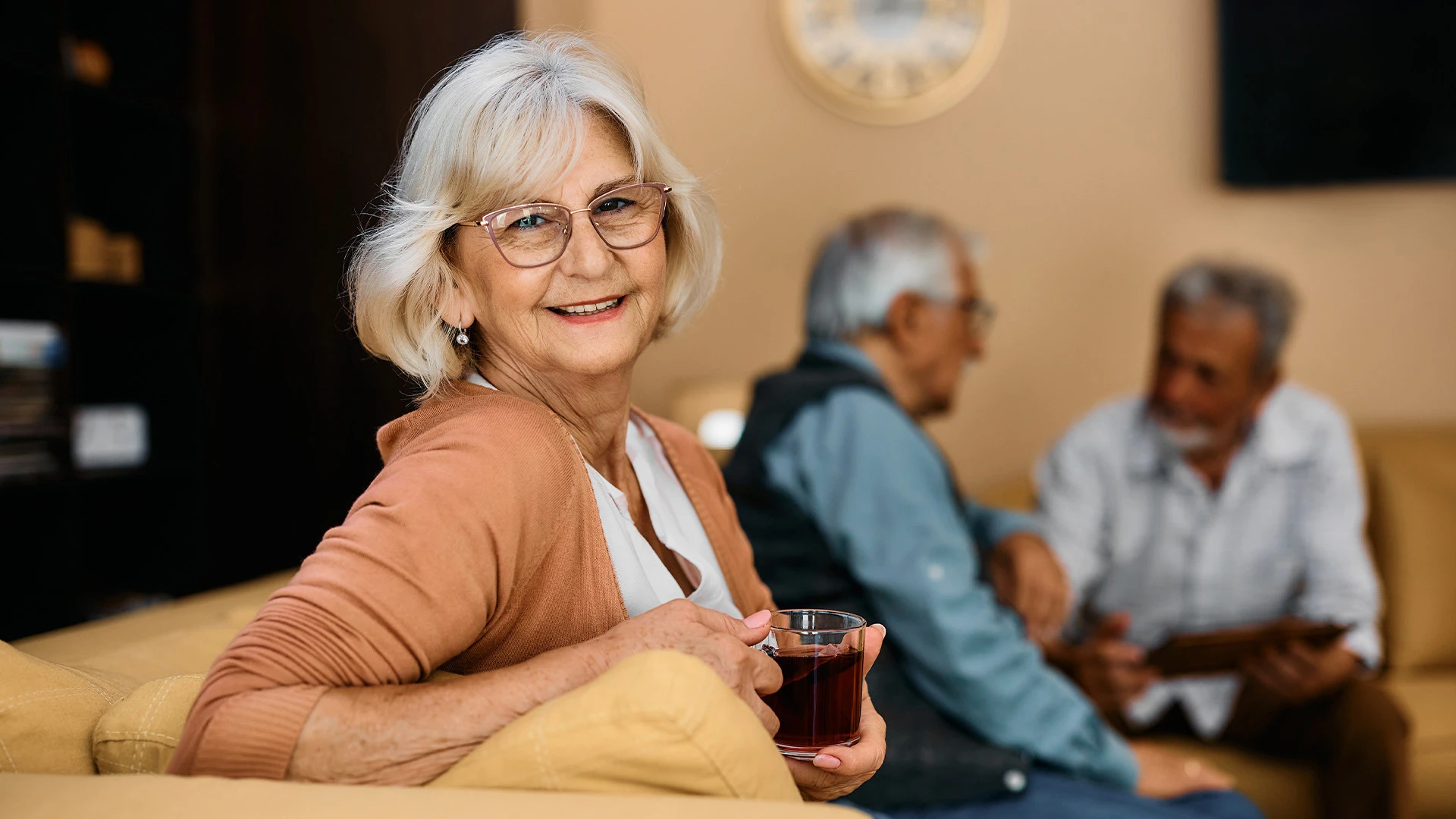 group of friends talking at an assisted living facility