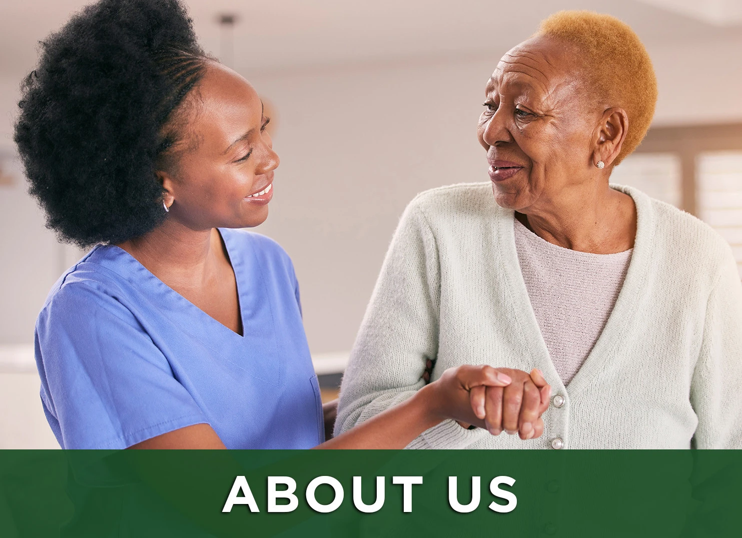 Image: Nurse helping senior woman at senior living community