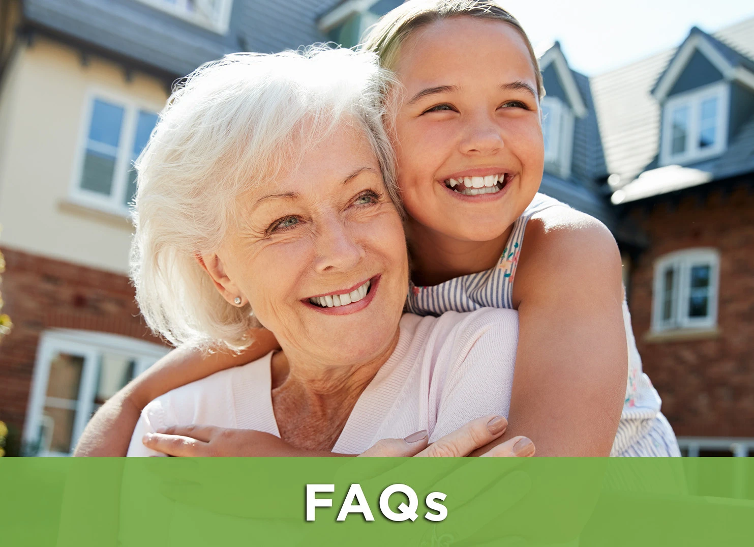Image of senior woman and grandchild smiling with a link to the FAQ page for more information