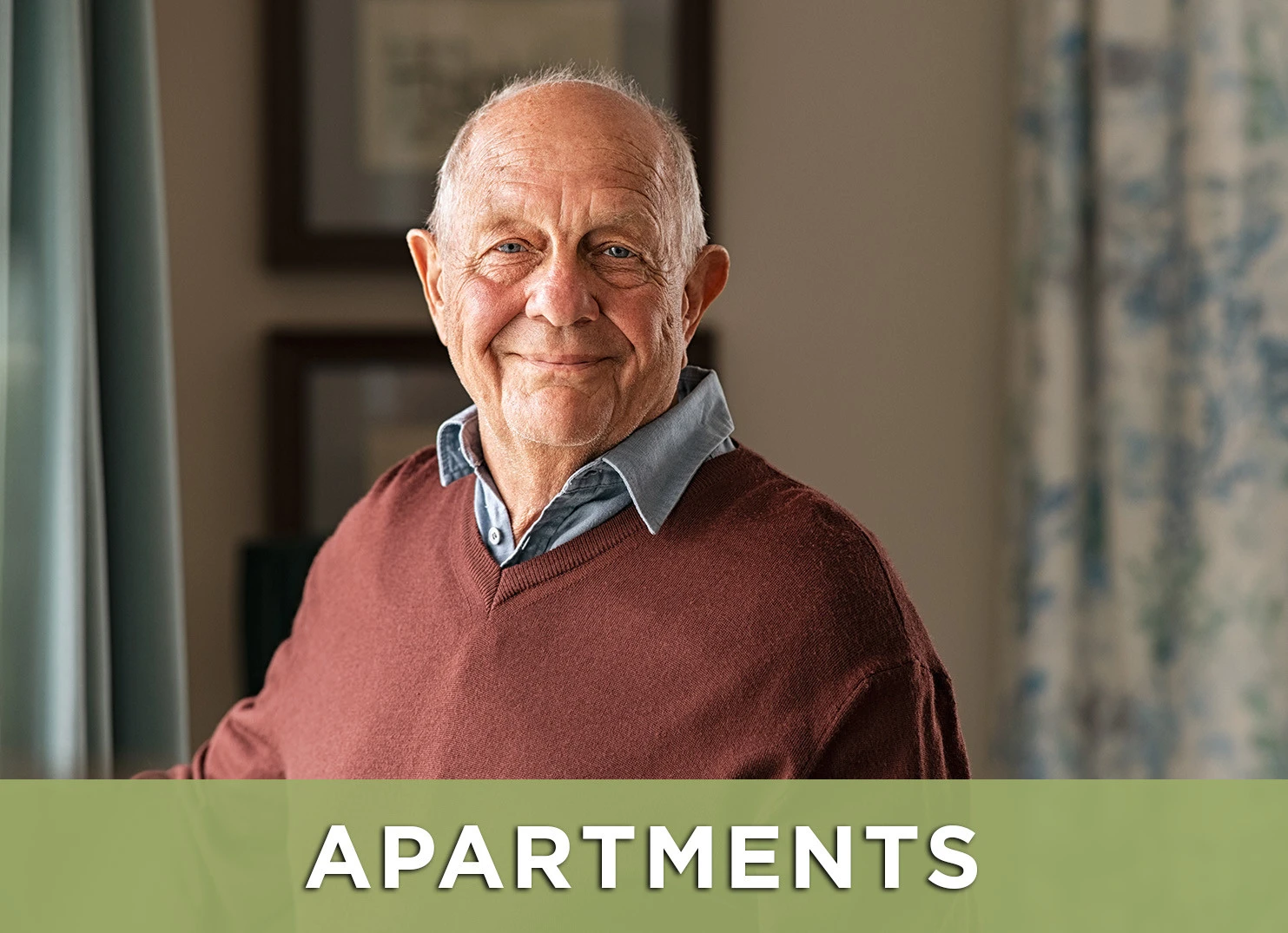 Image: Senior man smiling with. a link to the apartments page