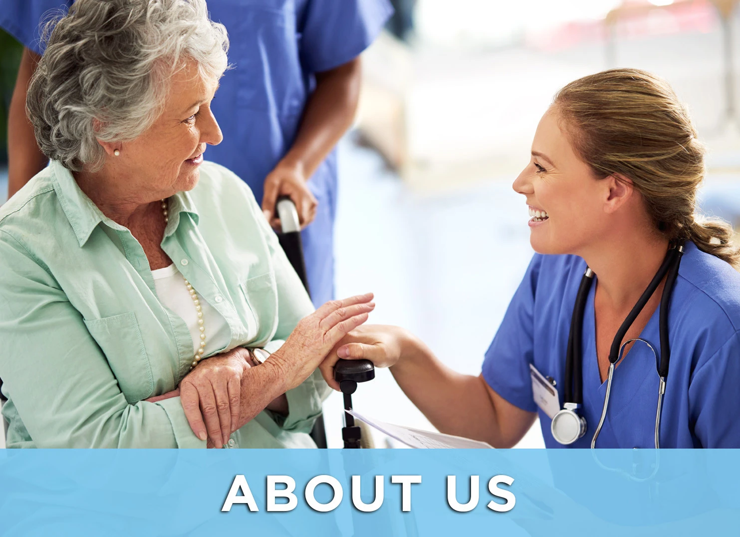 Image of senior woman in wheelchair talking to care team member; Link to About Us page