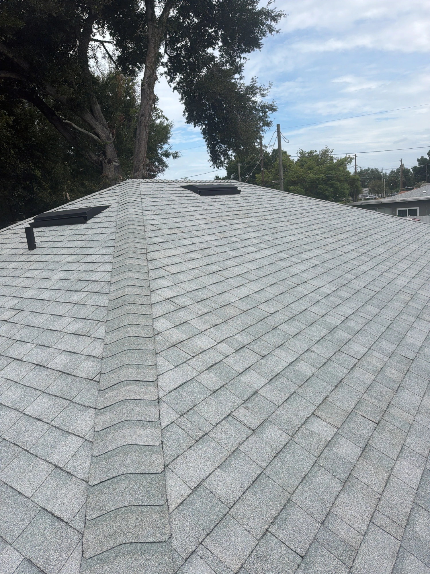 Architectural shingle roof replacement by R.I.G. Roofing in Polk County, FL