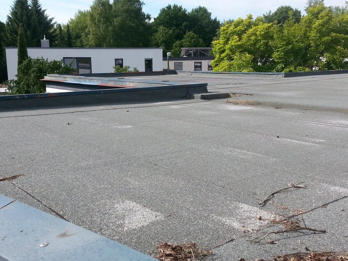 blog post Should I Replace My Old Commercial Roof Or Patch It Instead?