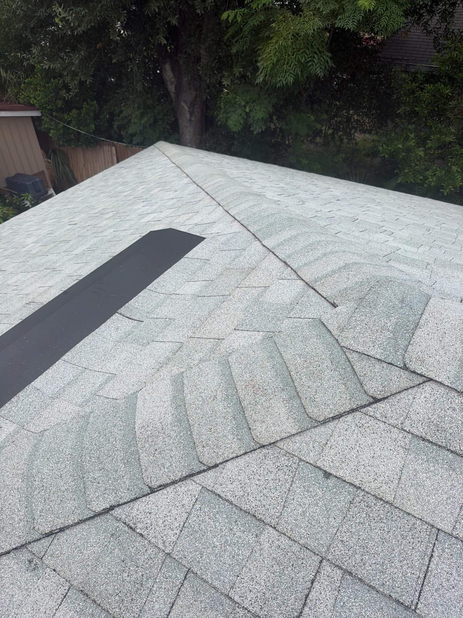 Completed shingle roof replacement by R.I.G. Roofing