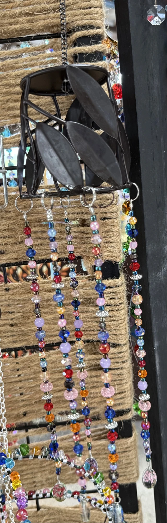 item Upcycled black metal canister with multicolored glass beads IMG_4349.webp